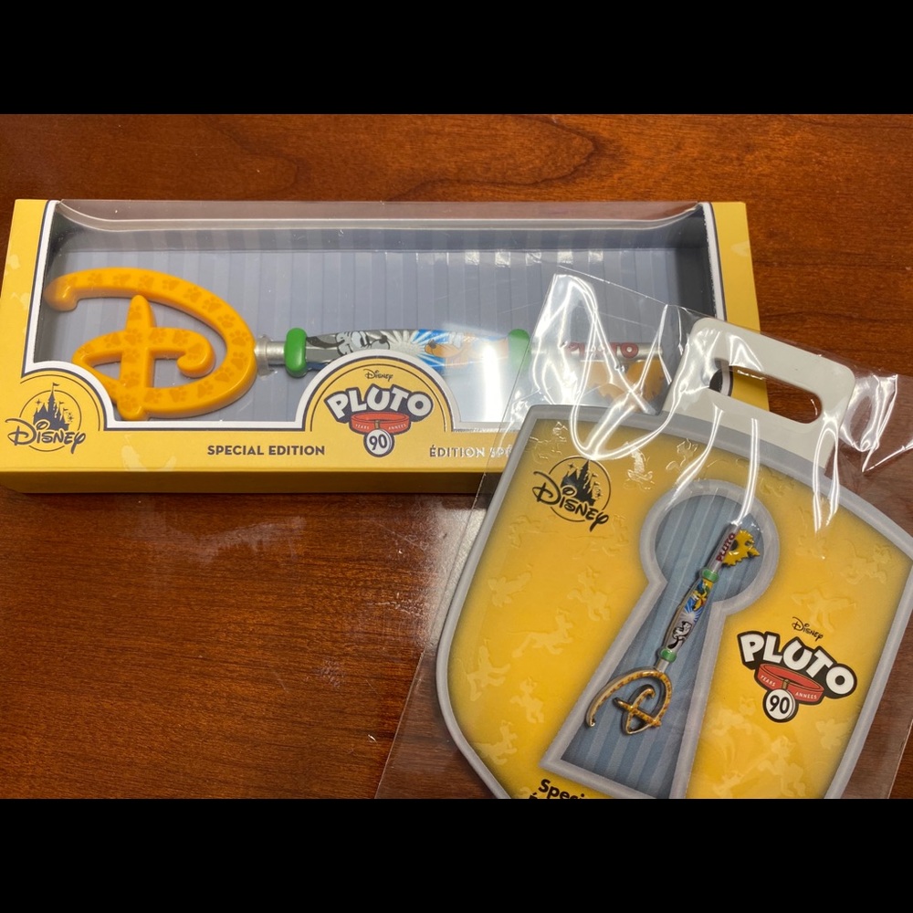 Brand new Pluto Key and Pin
